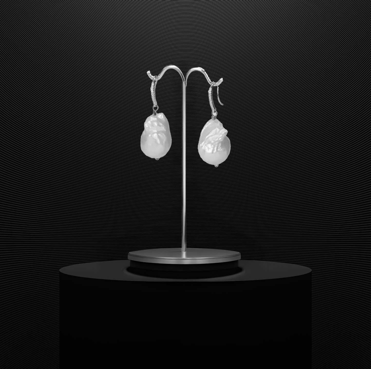 Baroque freshwater pearls on sterling silver wire with CZ accents, offering a timeless, elegant design.