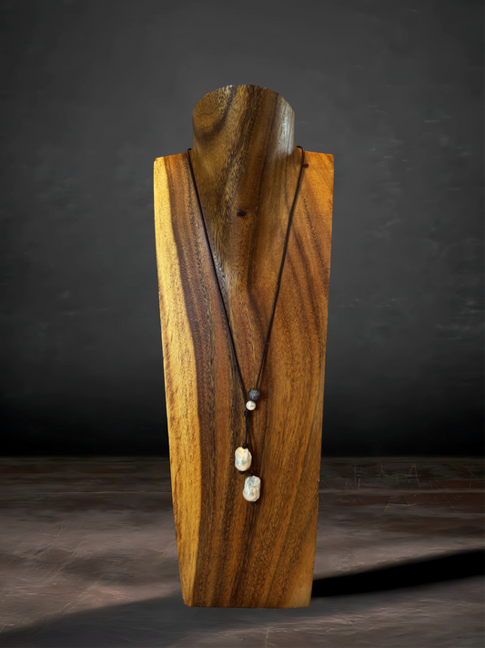 A 36" Baroque freshwater pearl necklace with one additional pearl and a CZ accent, exuding timeless charm.