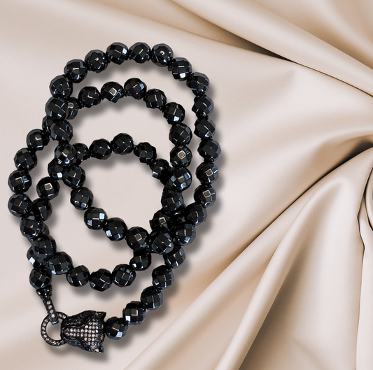 A trio of matte onyx bracelets with CZ accents, perfect for stacking or wearing solo.