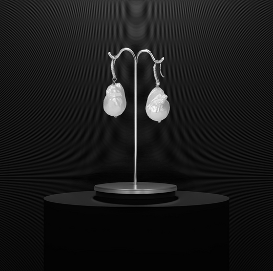 Baroque freshwater pearls on sterling silver wire with CZ accents, offering a timeless, elegant design.