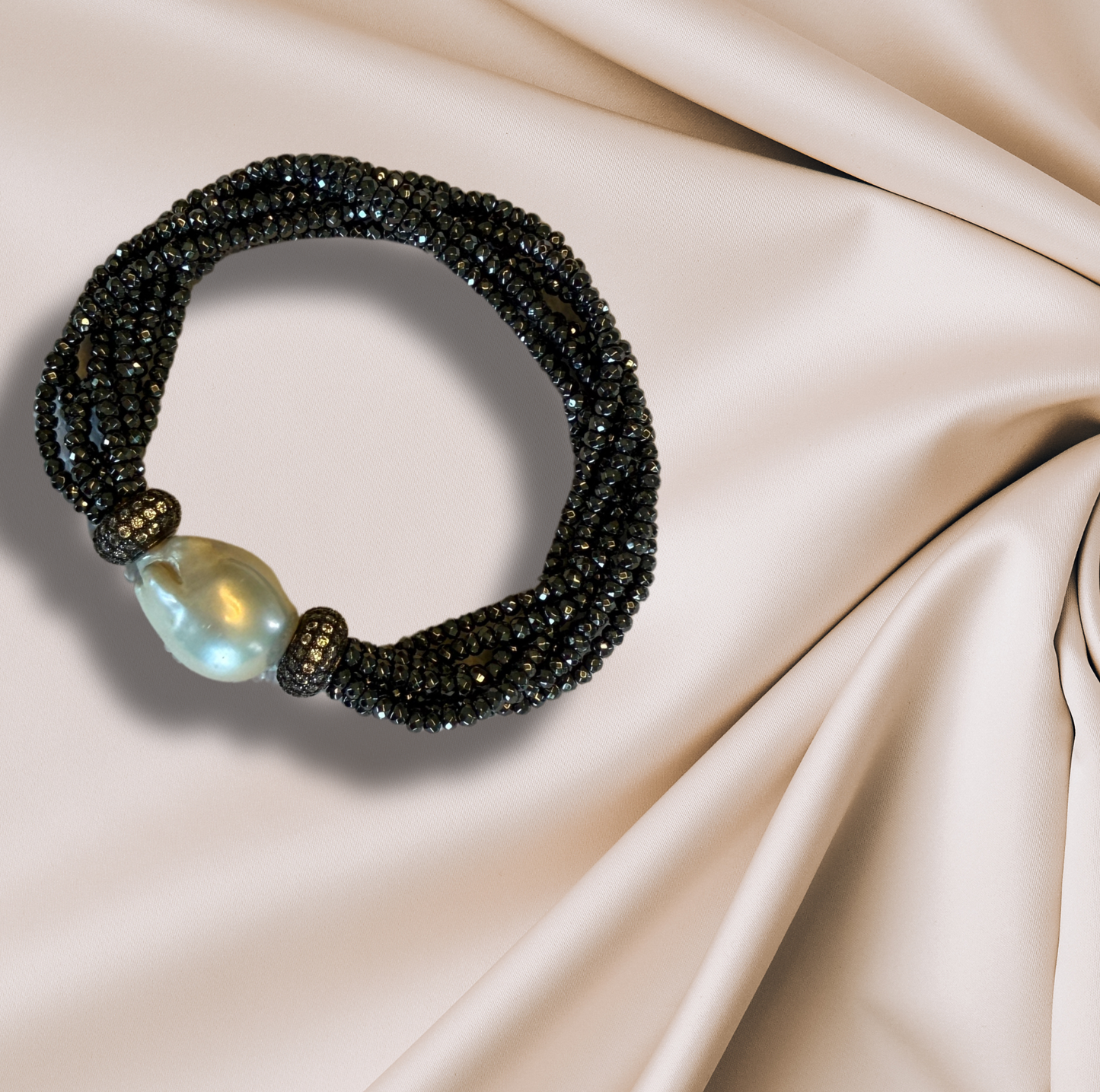 A hematite cluster bracelet with CZ accents.