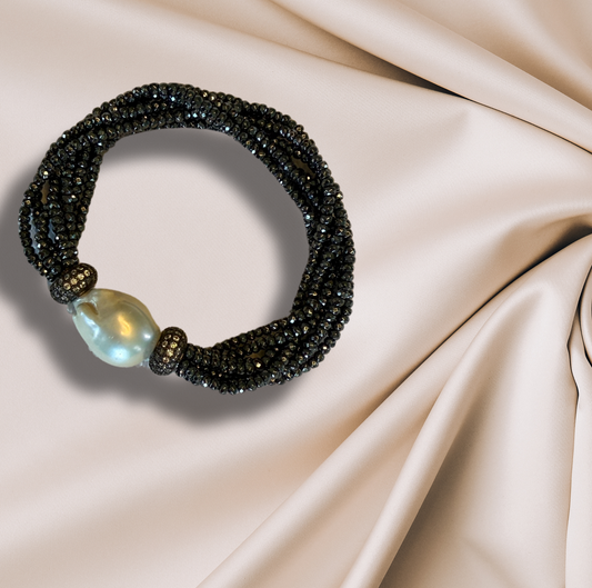 A hematite cluster bracelet with CZ accents.